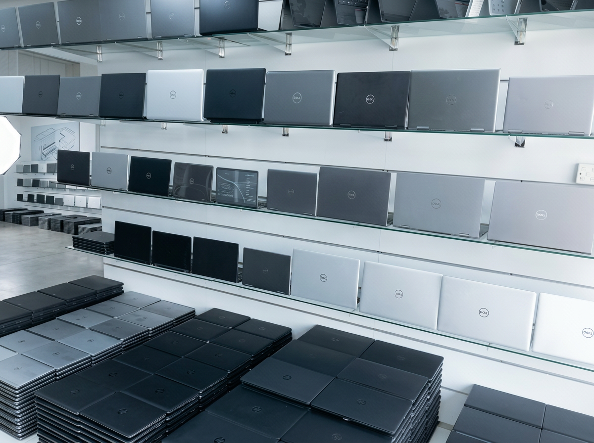 Rows of refurbished laptops in the Bayebu warehouse